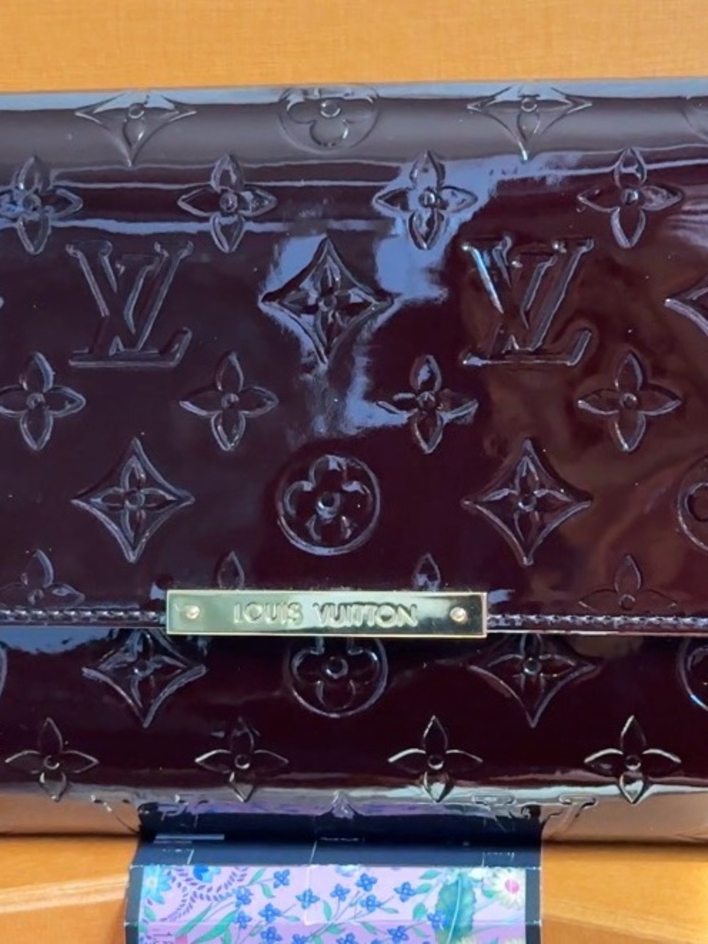 Louis Vuitton Robertson LV Monogram Vernis clutch in Amarante